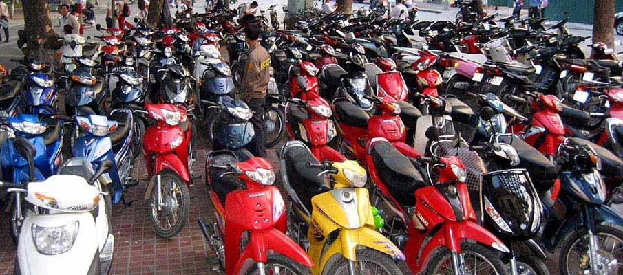Hoi An motorbike rental fleet parked in Ancient Town